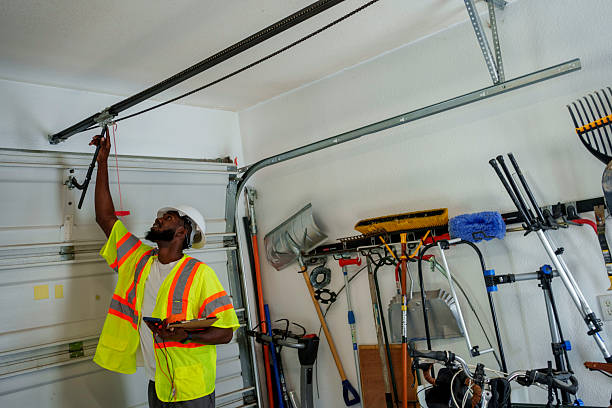 Professional Garage Door Panel Replacement technician working in Eldridge, IA